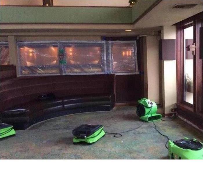 Picture of a room with Servpro fans positioned around it